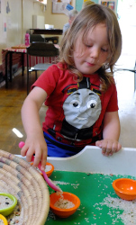 beans and rice sensory play