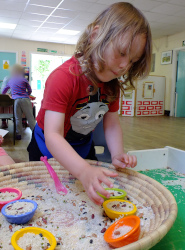 beans and rice sensory play