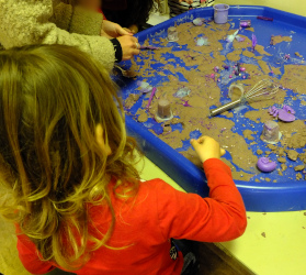 playing with lavender sand