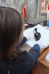 handling 2500 year old pots