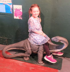 riding a dinosaur