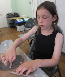 making pottery faces