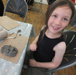 making pottery faces