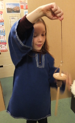 using a drop spindle