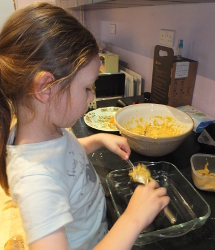 spooning into oven dish